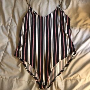 Black white and red striped bodysuit